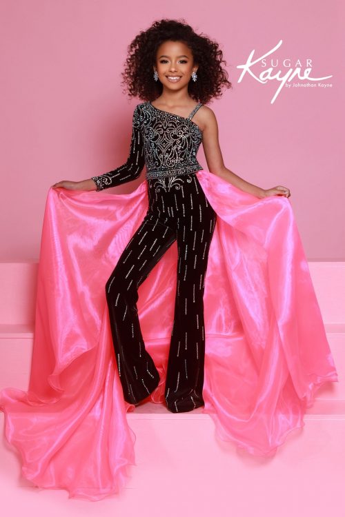 One-shoulder black velvet girls pageant jumpsuit and detachable hot pink organza skirt, perfect for talent, runway, or fun fashion.